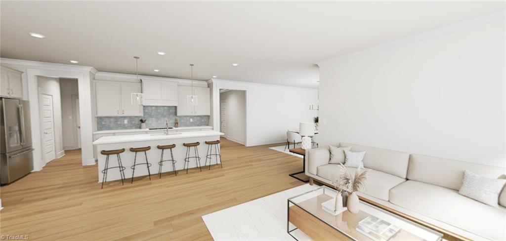 6749 Honeycutt Reserve Drive Oak Ridge, NC 27310 - Photo 4 of 18 Kitchen-Family Room-Virtual Representation Not actual home - Some Features may be different in actual home.