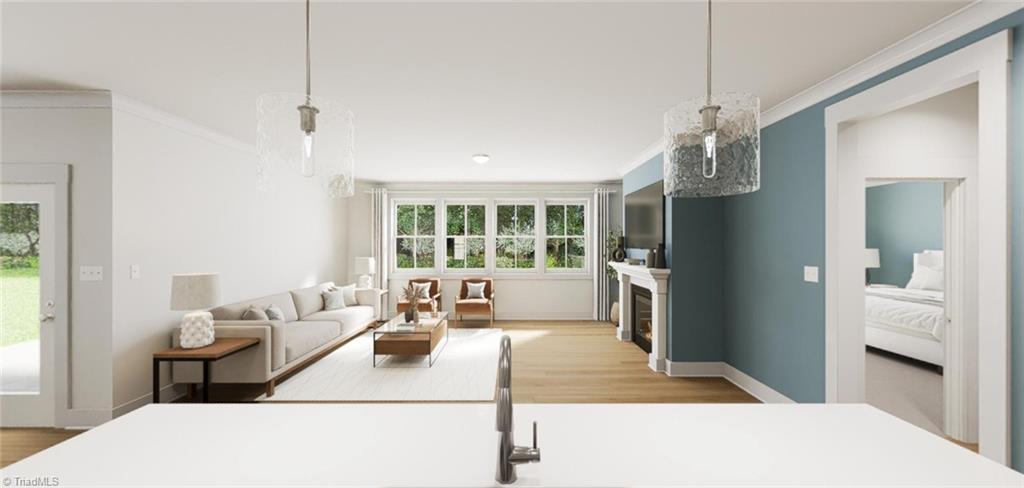 6749 Honeycutt Reserve Drive Oak Ridge, NC 27310 - Photo 5 of 18 Family Room-Virtual Representation Not actual home - Some Features may be different in actual home.