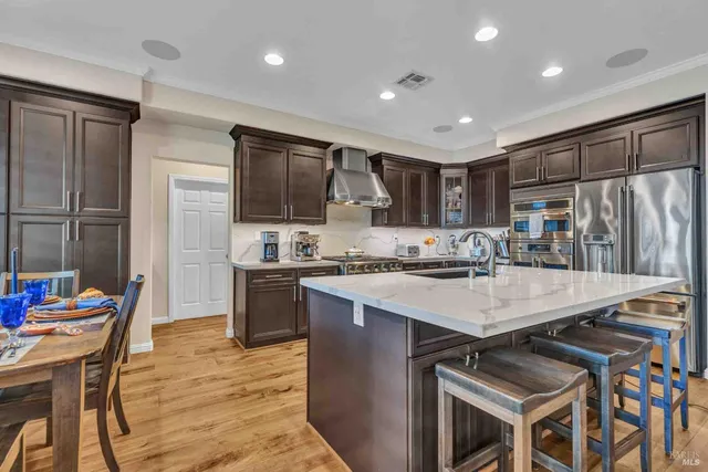 a view of a house with a yard porch and sitting area