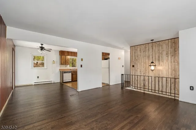 a view of a livingroom with wooden floor