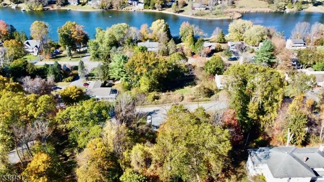 a view of a lake with sitting area
