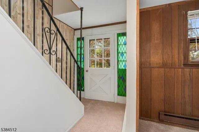 a view of an entryway with staircase