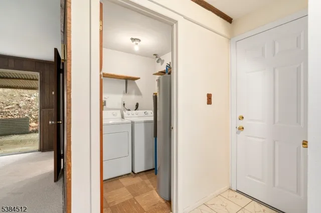 a view of a bathroom from a hallway
