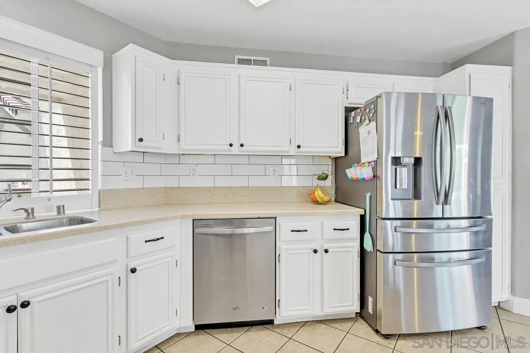 224 Parkside Place Santee, CA 92071 - Photo 18 of 50 a kitchen with appliances cabinets and a sink