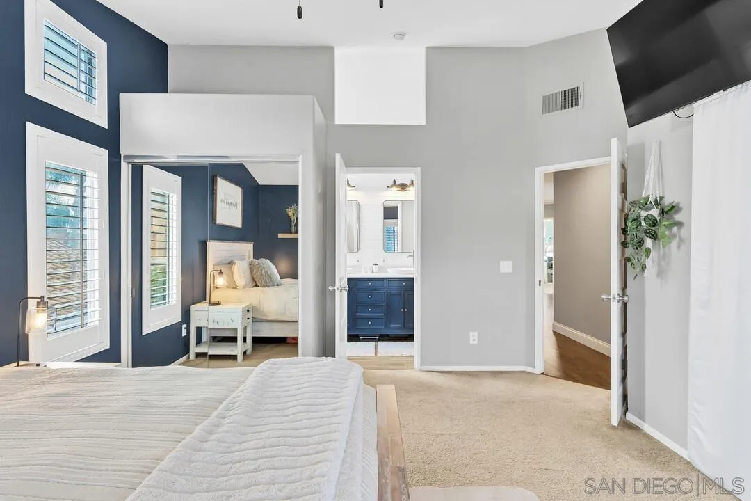 224 Parkside Place Santee, CA 92071 - Photo 24 of 50 a bedroom with furniture and a large window