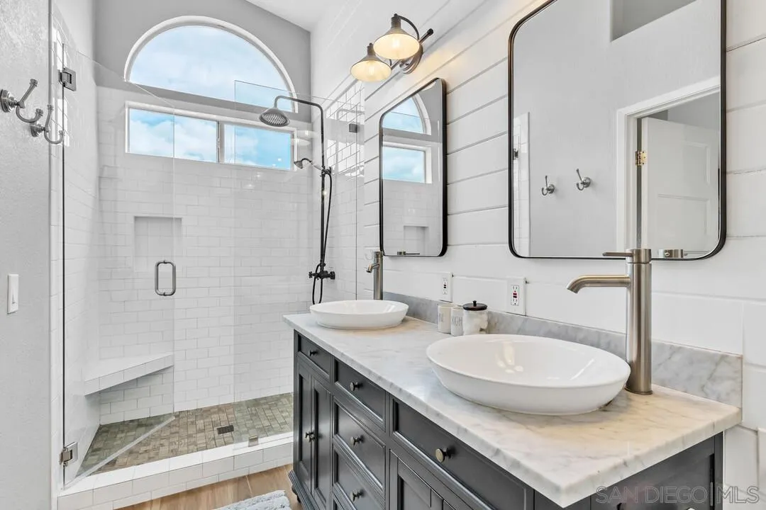 224 Parkside Place Santee, CA 92071 - Photo 25 of 50 a bathroom with a sink and a mirror