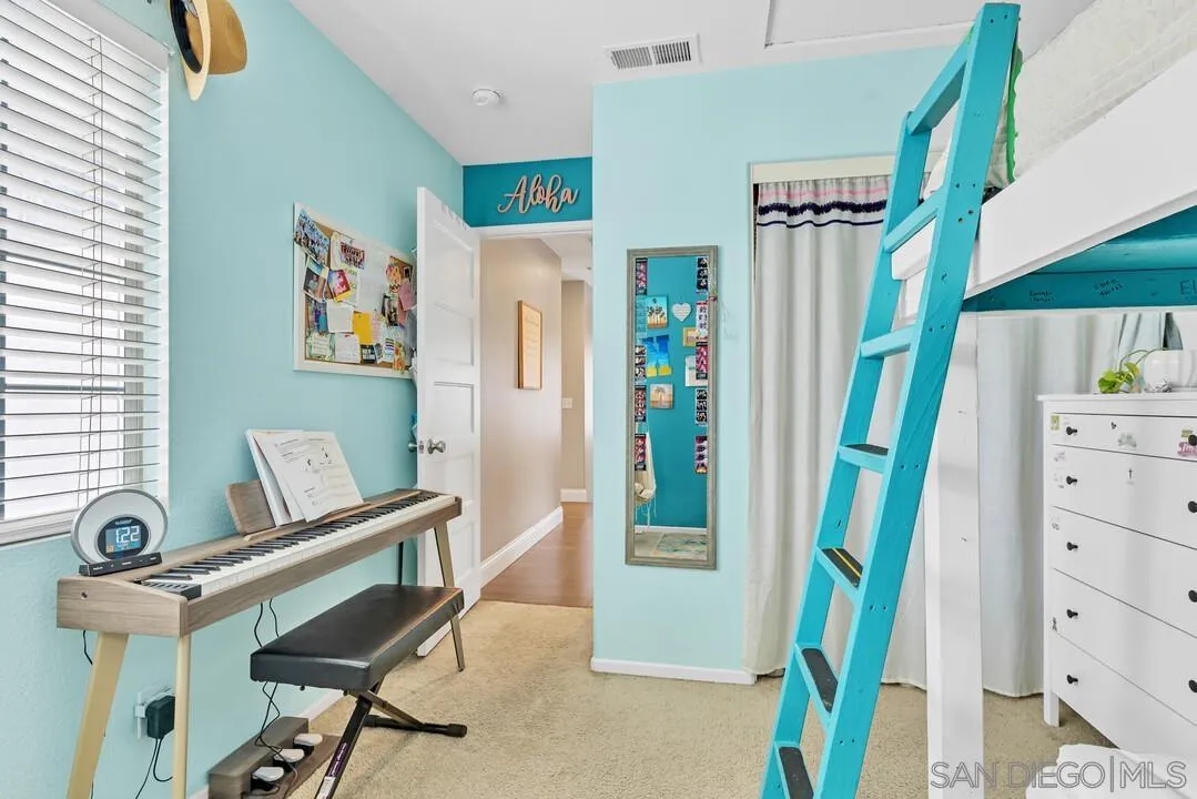 224 Parkside Place Santee, CA 92071 - Photo 31 of 50 a view of a bedroom with furniture and staircase