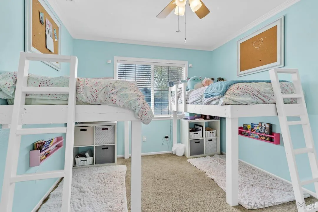 224 Parkside Place Santee, CA 92071 - Photo 32 of 50 a utility room with stainless steel appliances wooden floor and chandelier