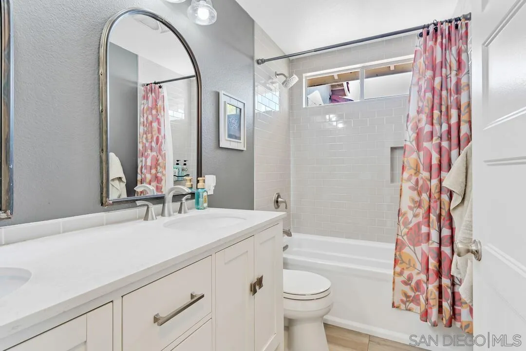 224 Parkside Place Santee, CA 92071 - Photo 37 of 50 a bathroom with a sink a toilet and shower