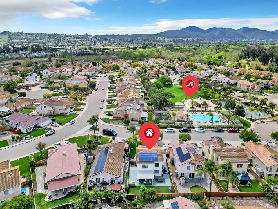224 Parkside Place Santee, CA 92071 - Photo 47 of 50 an aerial view of a city with lots of residential buildings ocean and mountain view in back