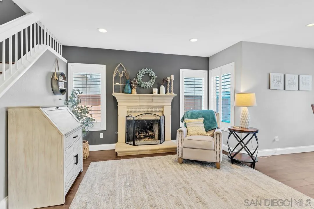 224 Parkside Place Santee, CA 92071 - Photo 7 of 50 a living room with furniture and a fireplace