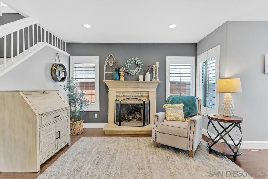 224 Parkside Place Santee, CA 92071 - Photo 8 of 50 a living room with furniture and a fireplace