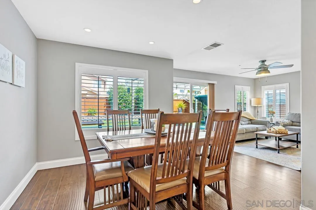 224 Parkside Place Santee, CA 92071 - Photo 10 of 50 a view of a dining room with furniture window and wooden floor