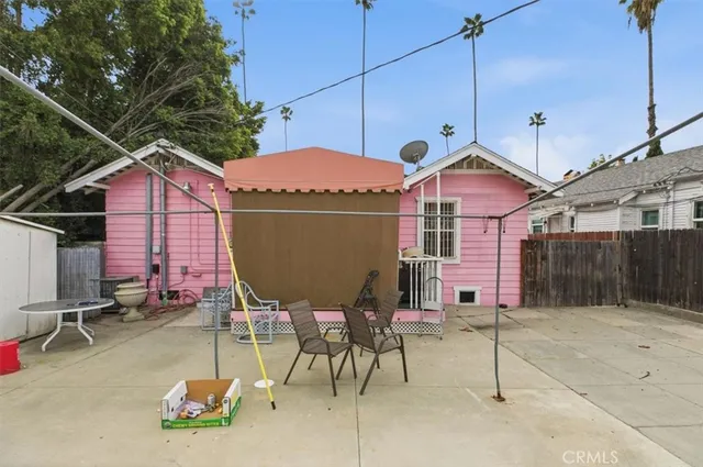 a view of a chairs and table in patio