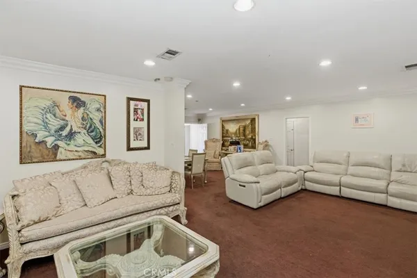 a living room with furniture and a couch
