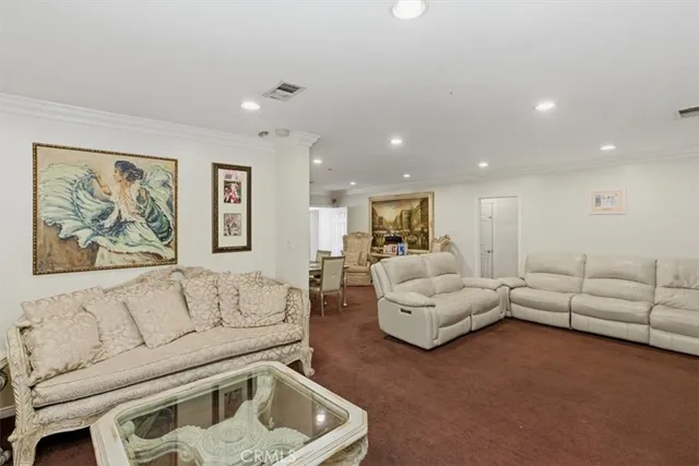 a living room with furniture and a couch