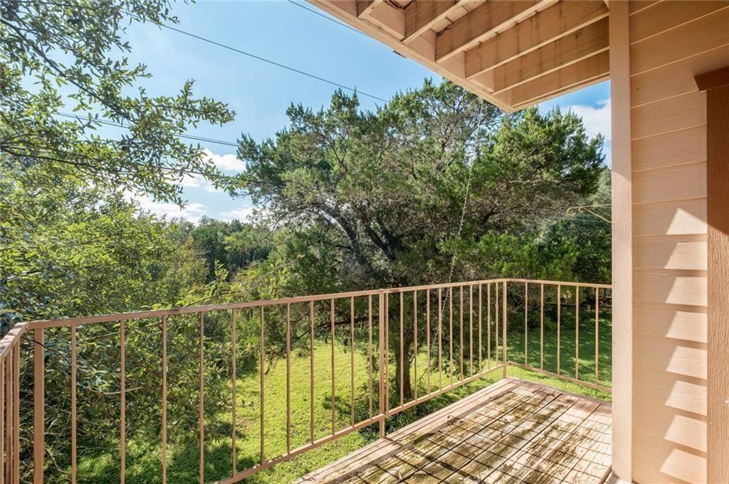 5305 Indio Cove, Unit B Austin, TX 78745 - Photo 14 of 19 a balcony with trees in front of it