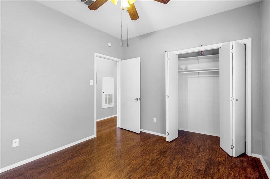 5305 Indio Cove, Unit B Austin, TX 78745 - Photo 17 of 19 a view of empty room with wooden floor and ceiling fan