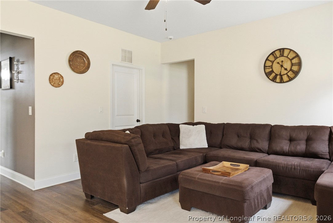 240 Meherrin Loop Raeford, NC 28376 - Photo 13 of 50 a living room with furniture and a couch
