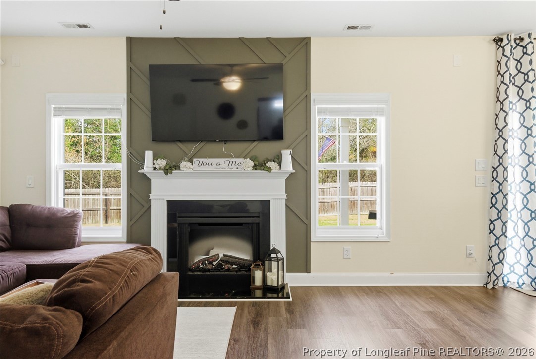 240 Meherrin Loop Raeford, NC 28376 - Photo 14 of 50 a living room with furniture and a fireplace