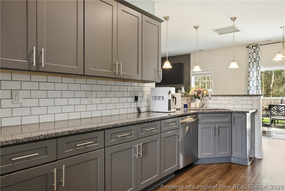 240 Meherrin Loop Raeford, NC 28376 - Photo 17 of 50 a kitchen with a sink and cabinets