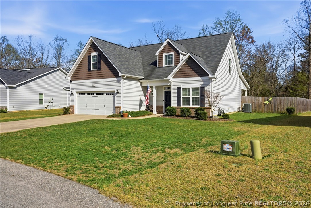 240 Meherrin Loop Raeford, NC 28376 - Photo 2 of 50 a front view of a house with a yard