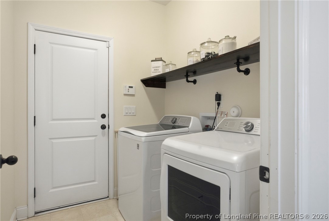 240 Meherrin Loop Raeford, NC 28376 - Photo 22 of 50 a utility room with dryer and washer