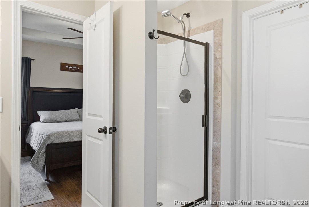 240 Meherrin Loop Raeford, NC 28376 - Photo 29 of 50 a bathroom with a shower and a sink