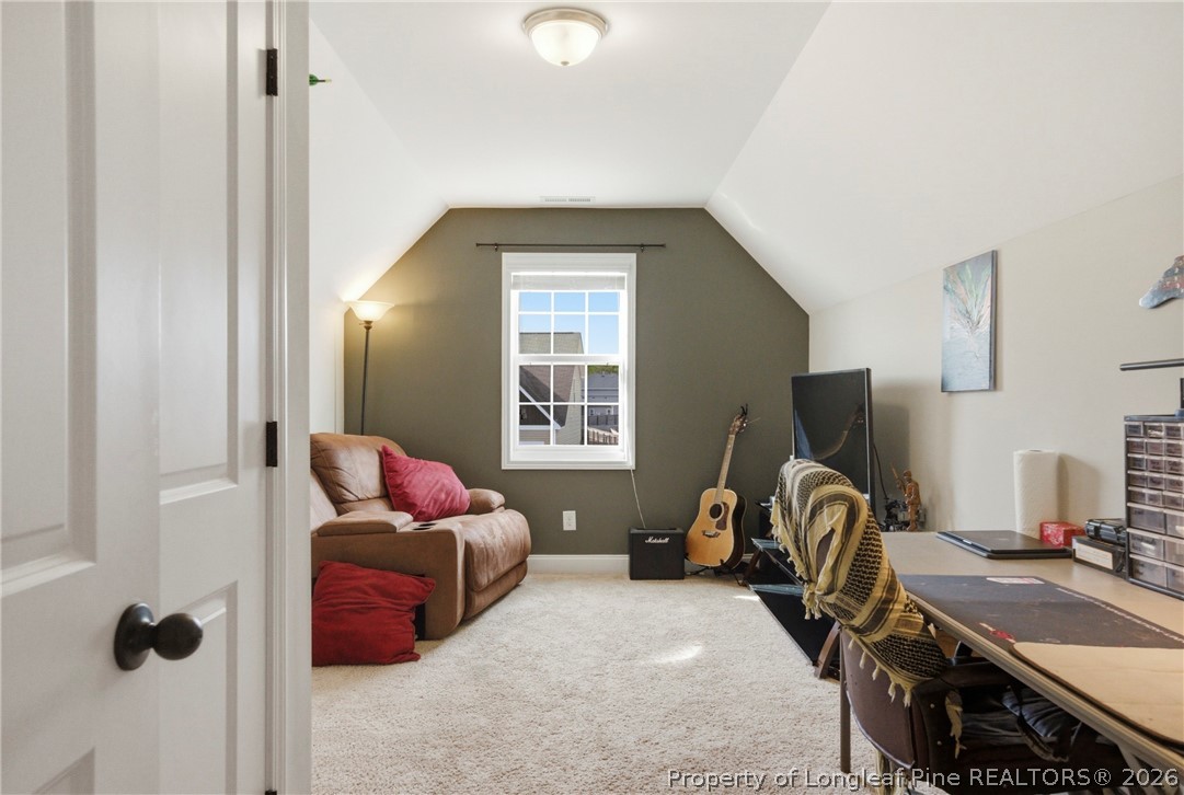 240 Meherrin Loop Raeford, NC 28376 - Photo 42 of 50 a room with furniture and a window