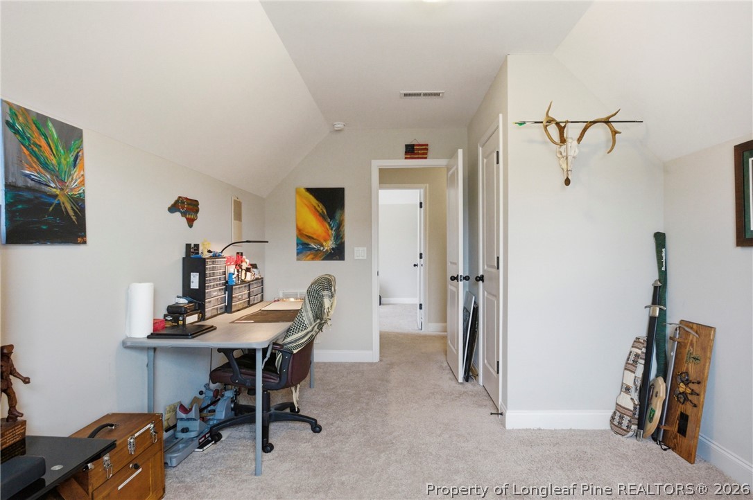 240 Meherrin Loop Raeford, NC 28376 - Photo 44 of 50 a view of a workspace with furniture