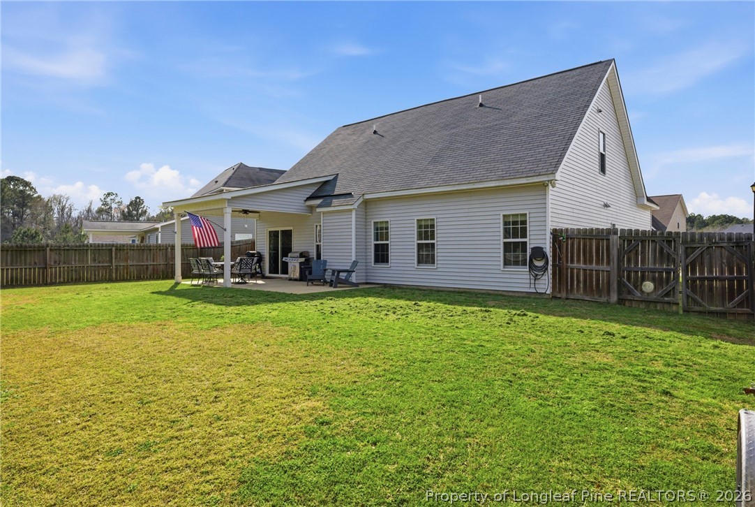 240 Meherrin Loop Raeford, NC 28376 - Photo 46 of 50 a front view of house with yard having outdoor seating