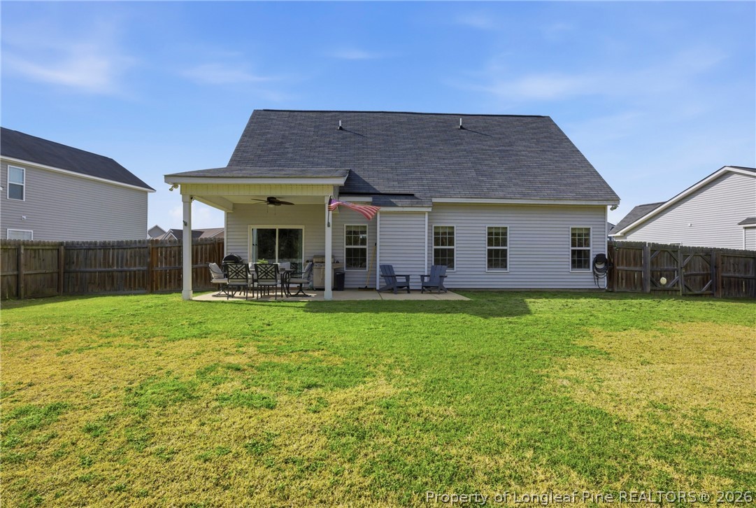 240 Meherrin Loop Raeford, NC 28376 - Photo 48 of 50 a view of a house with a backyard