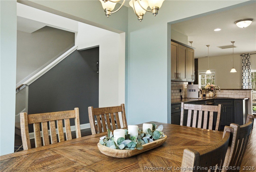 240 Meherrin Loop Raeford, NC 28376 - Photo 8 of 50 a view of a dining room with furniture