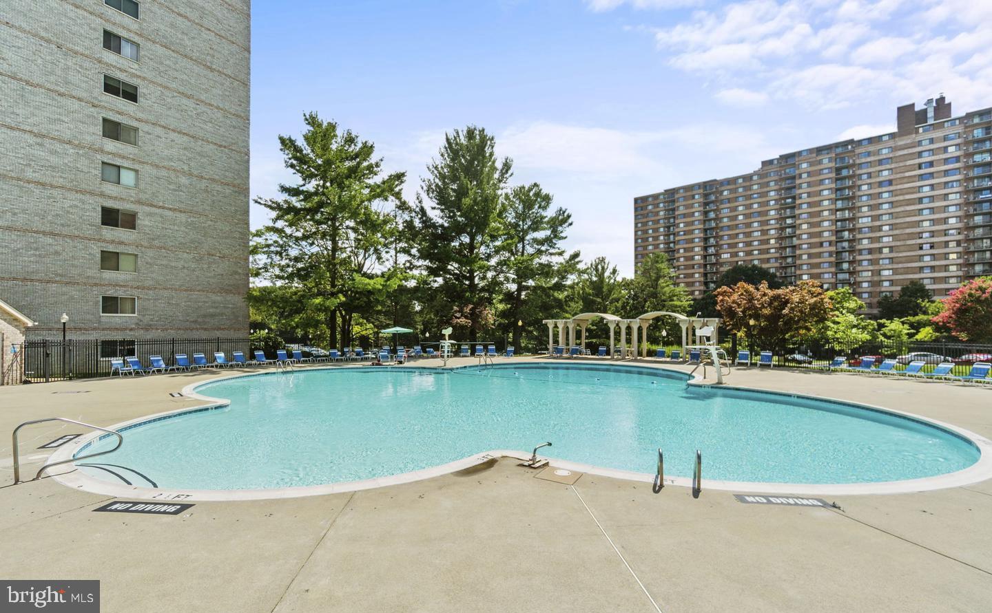 1111 University Boulevard West, Unit 1214A Silver Spring, MD 20902 - Photo 22 of 24 a view of a swimming pool with outdoor space