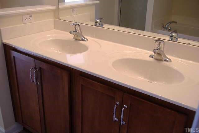 2604 Dutchman Creek Raleigh, NC 27610 - Photo 6 of 7 Master bath features upgraded marble countertops with dual sinks, garden tub & seperate shower Other
