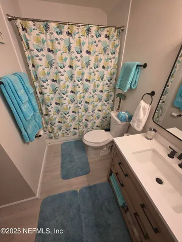 a house view with swimming pool in front of it