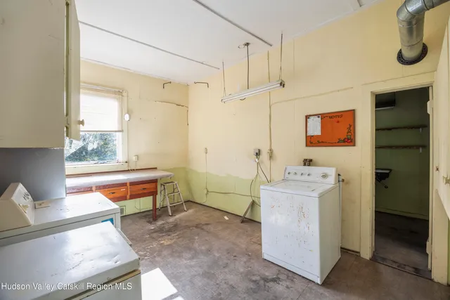 a room with storage and utility