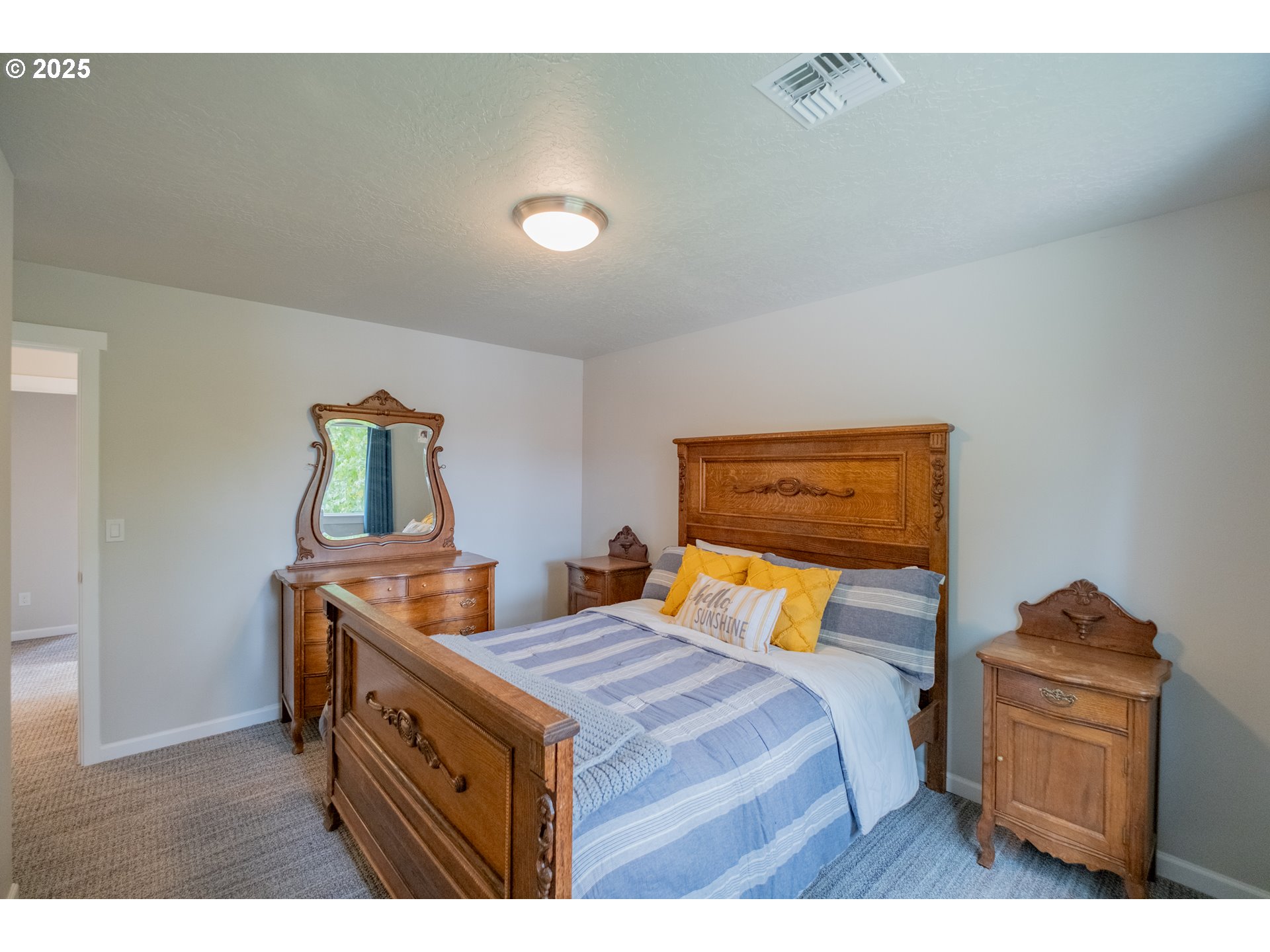 405 Northwest Juniper Lane Albany, OR 97321 - Photo 29 of 48 a bedroom with a bed and wooden floor