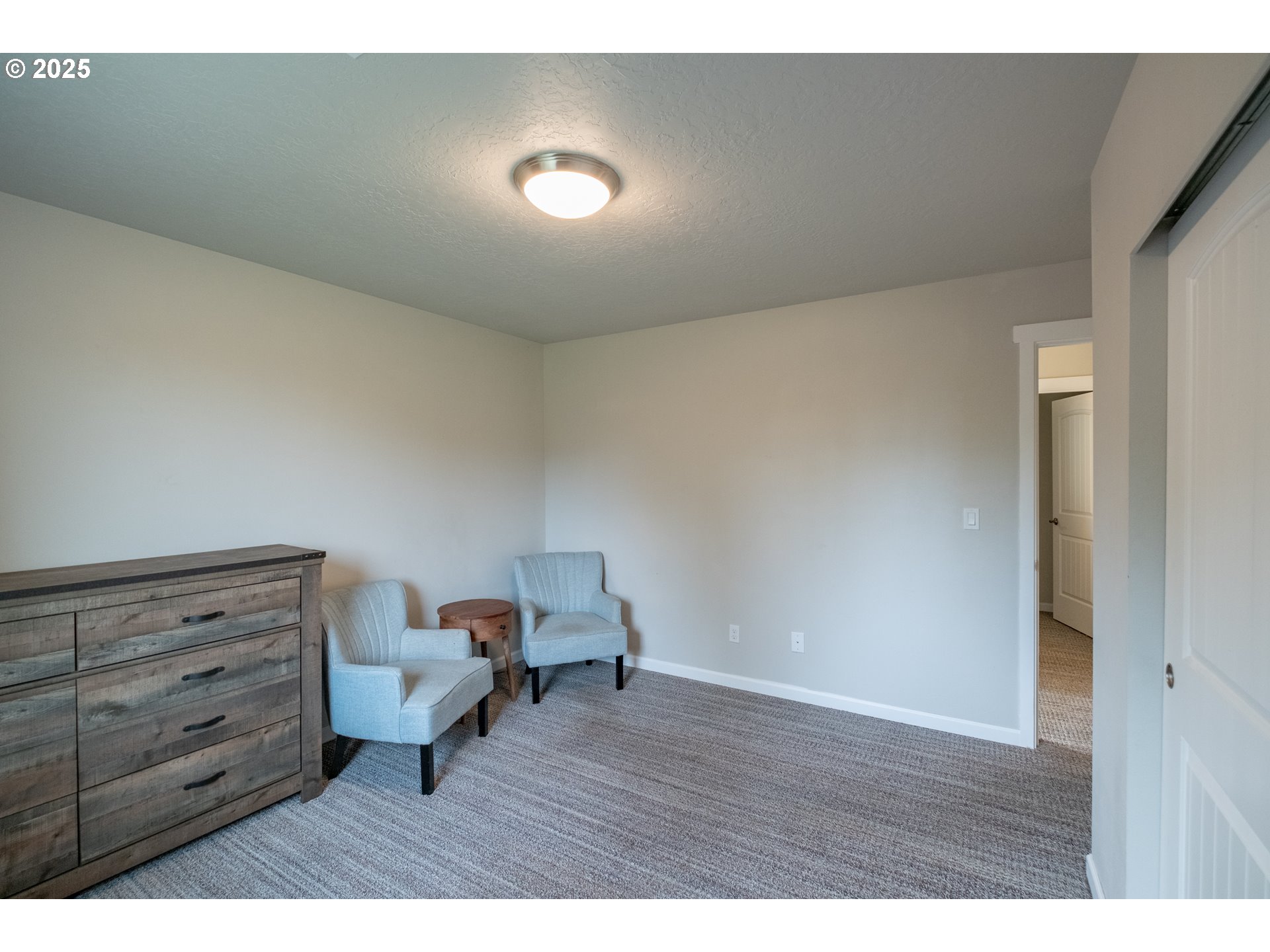 405 Northwest Juniper Lane Albany, OR 97321 - Photo 30 of 48 a view of room with furniture and wooden floor
