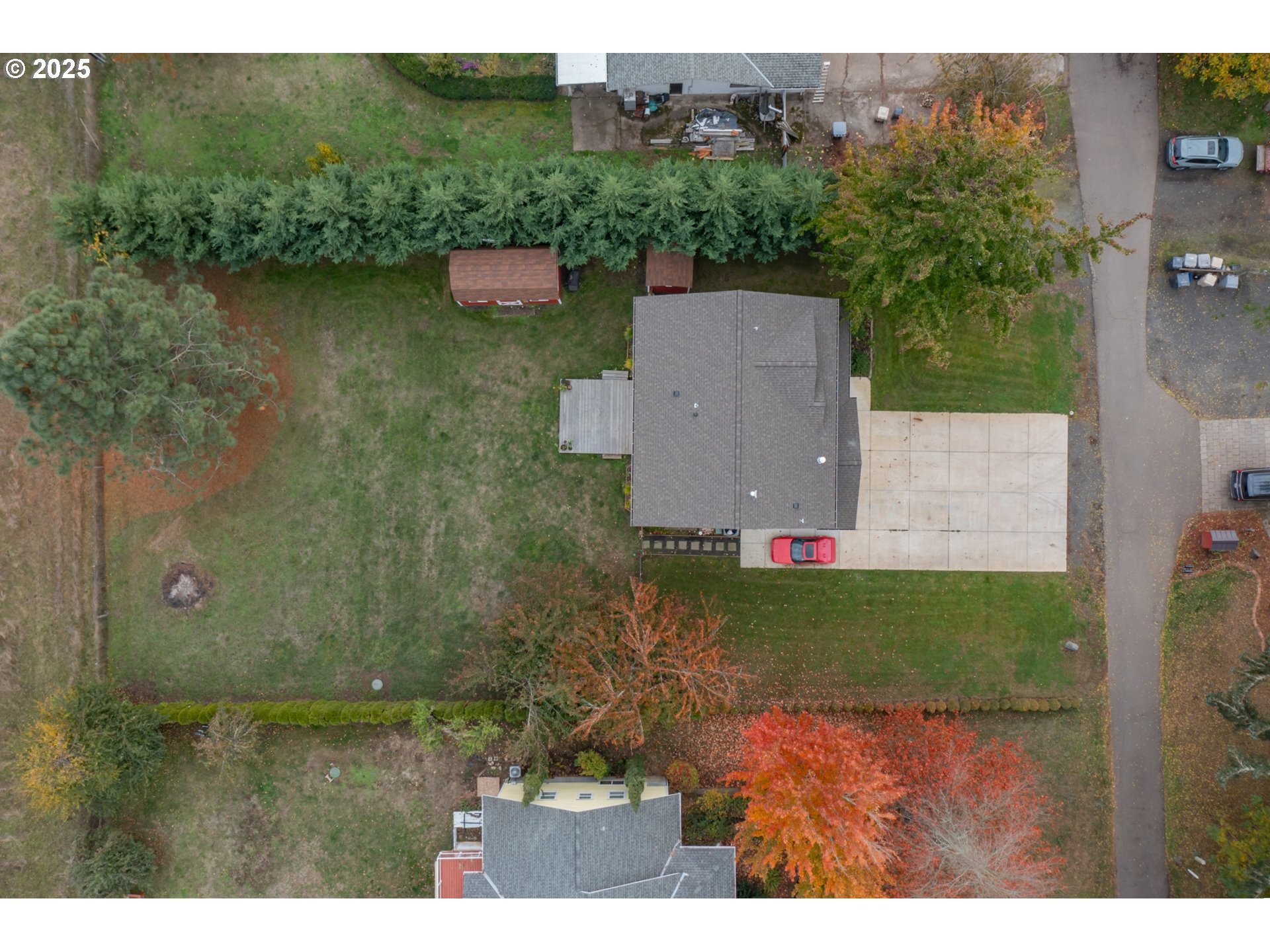 405 Northwest Juniper Lane Albany, OR 97321 - Photo 41 of 48 an aerial view of a house with a yard