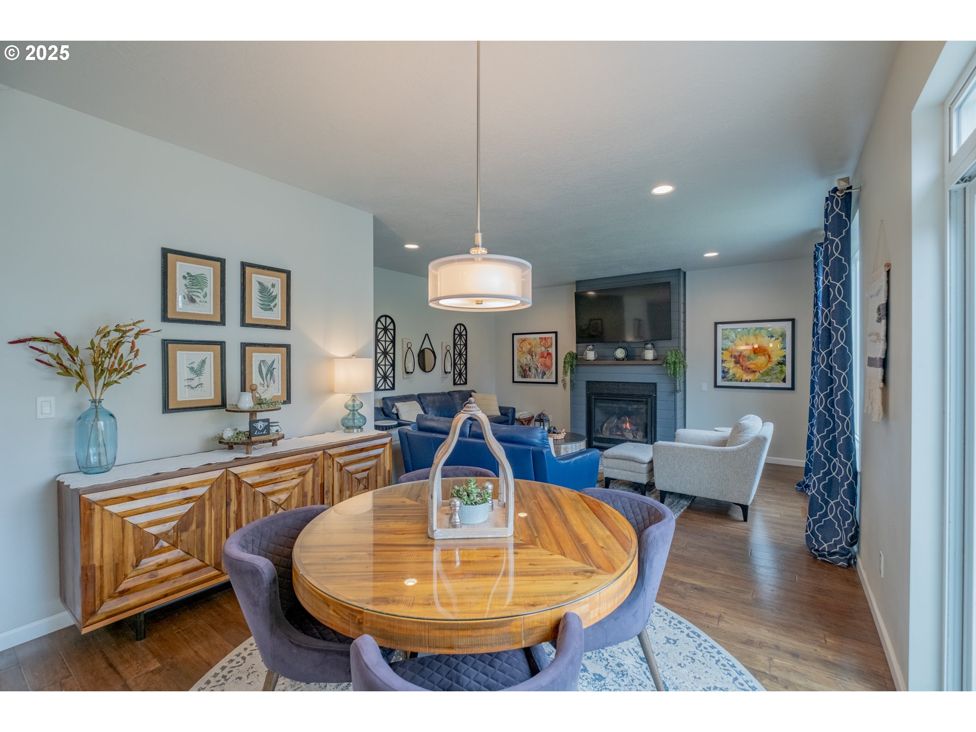 405 Northwest Juniper Lane Albany, OR 97321 - Photo 7 of 48 a living room with furniture a wooden floor and a chandelier