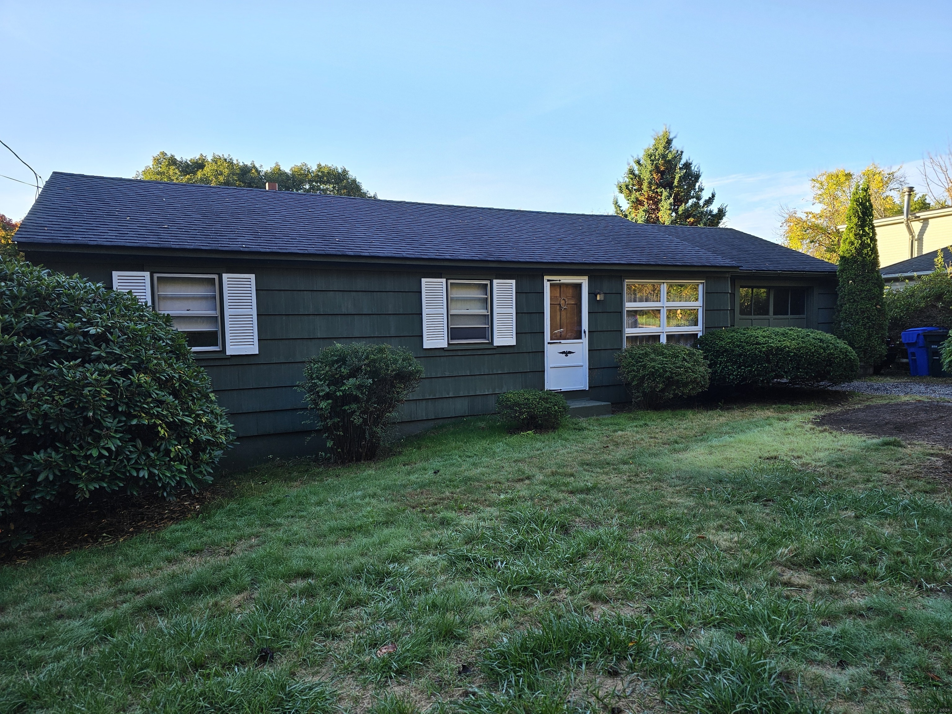 a view of a house with garden