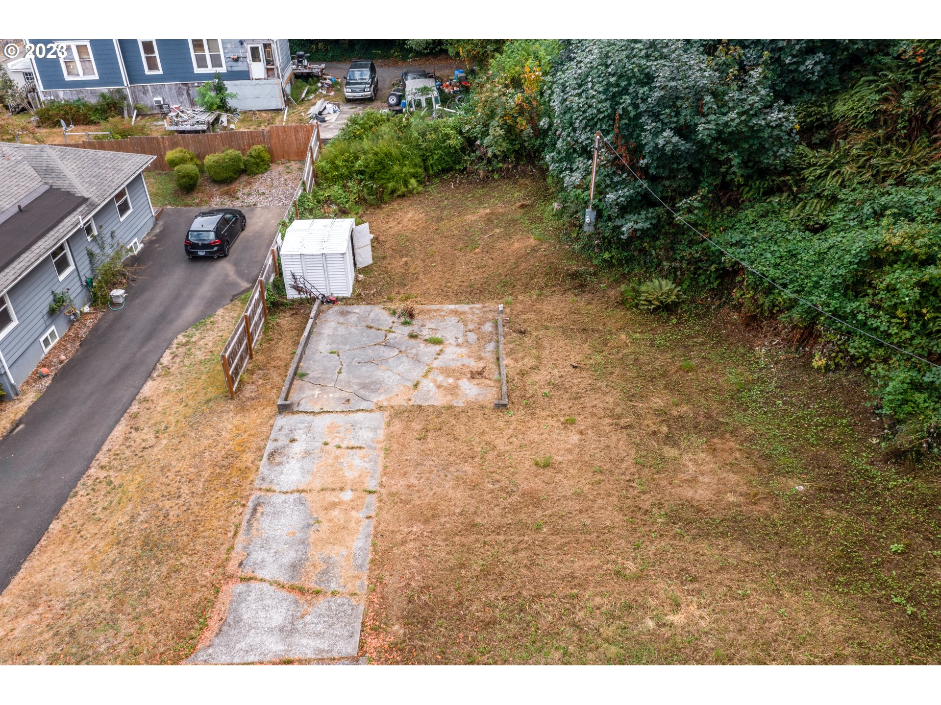 836 33rd Street Astoria, OR 97103 - Photo 6 of 11 a view of a yard with plants