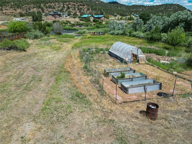 a view of a lake with a yard