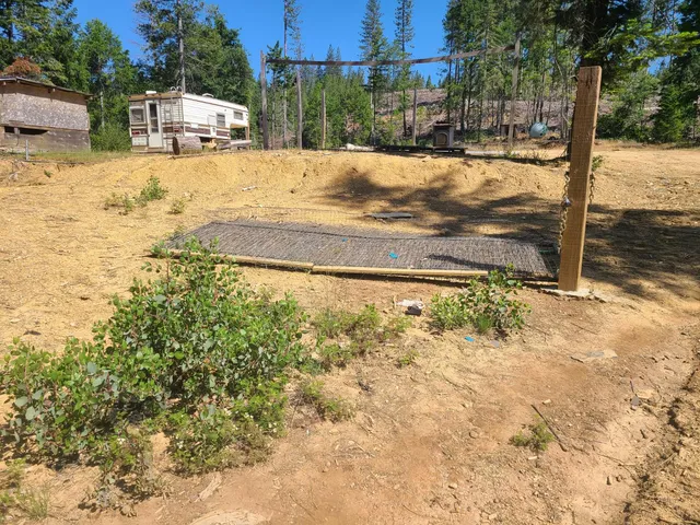 a view of yard covered with snow