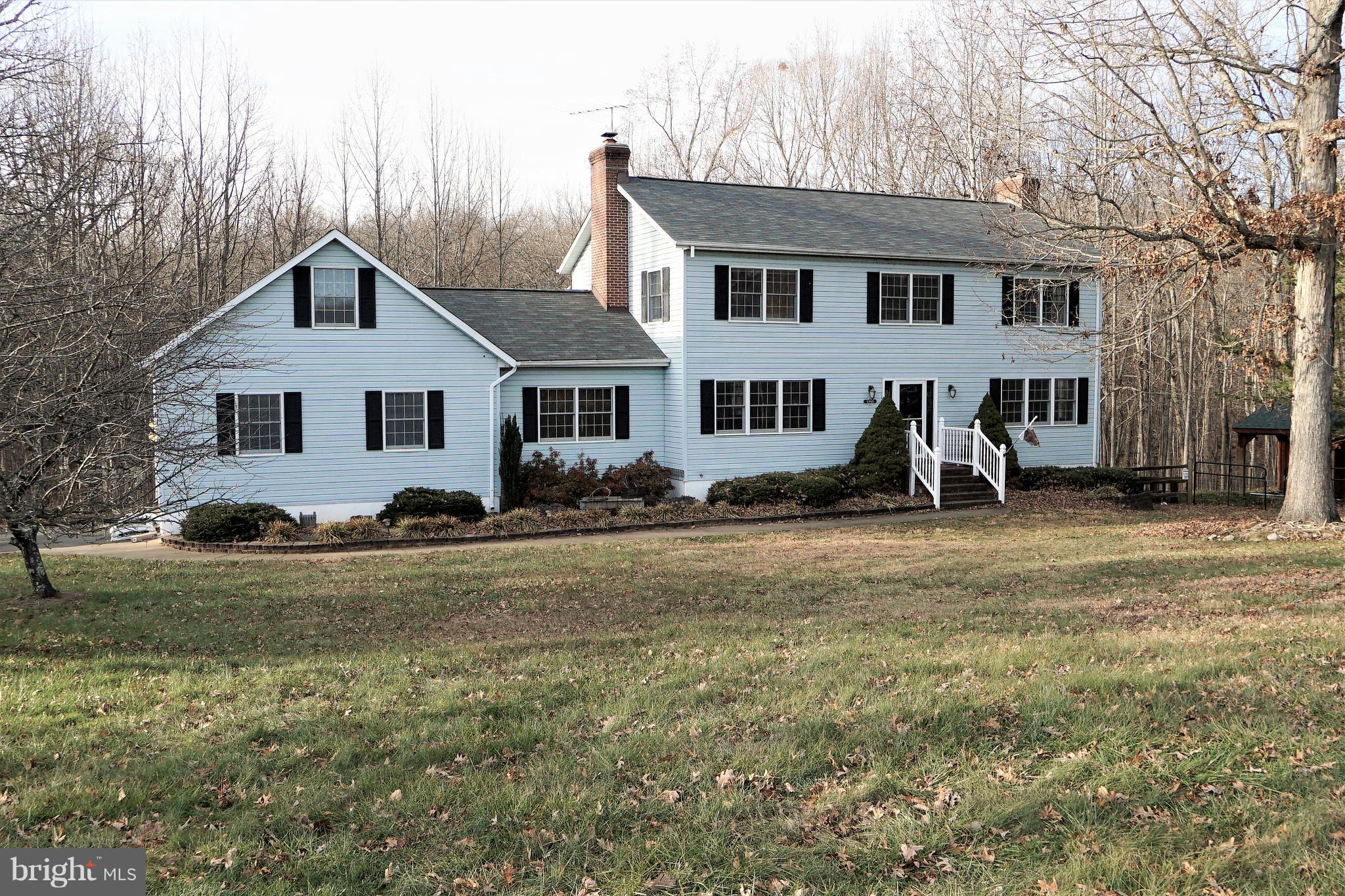 5940 Free State Road Marshall, VA 20115 - Photo 1 of 30 a view of a yard in front of a house