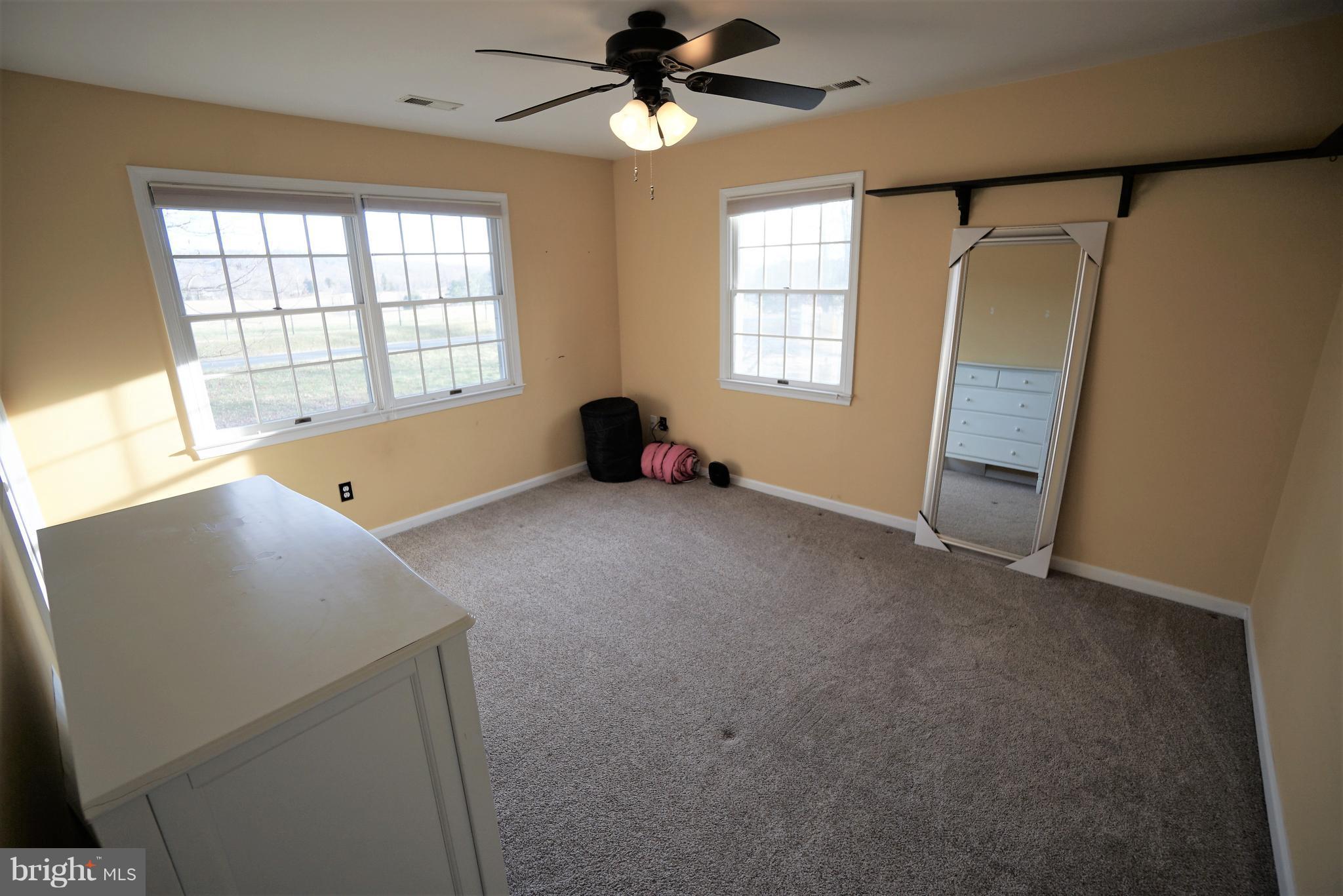 5940 Free State Road Marshall, VA 20115 - Photo 19 of 30 an empty room with windows and fan