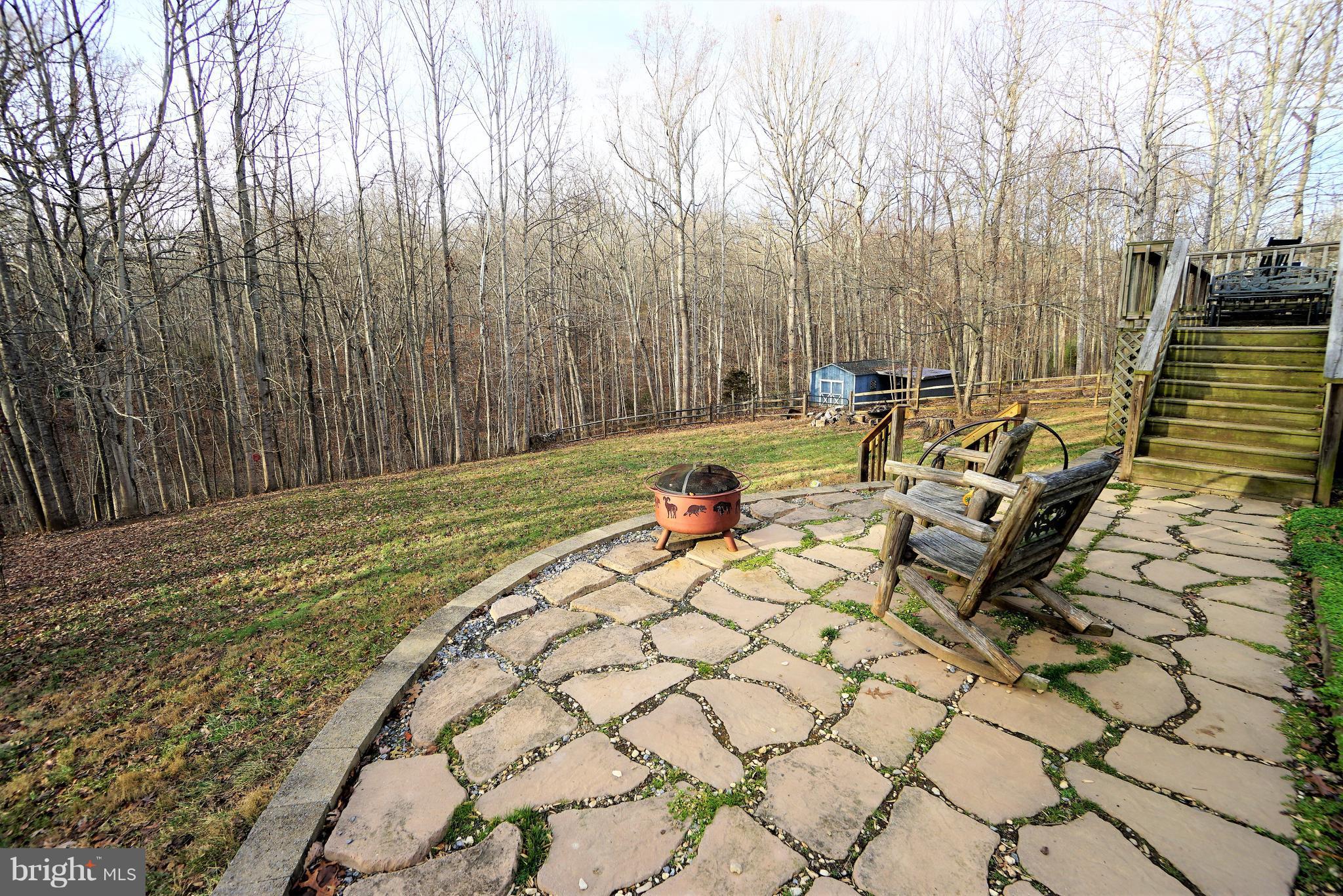 5940 Free State Road Marshall, VA 20115 - Photo 25 of 30 a view of a patio with a table and chairs