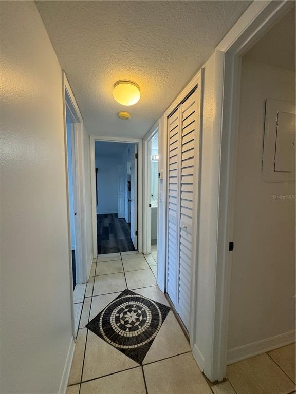 8213 Sun Spring Circle, Unit 61 Orlando, FL 32825 - Photo 16 of 44 a view of a hallway to a room