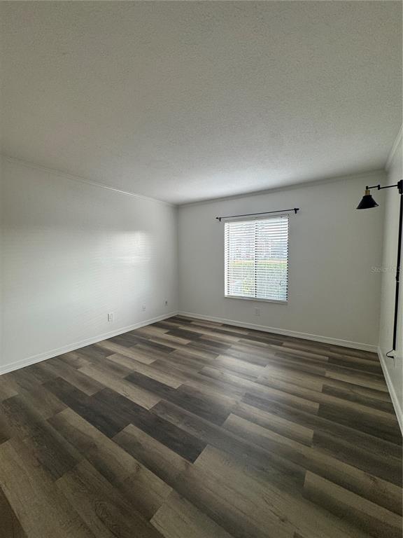 8213 Sun Spring Circle, Unit 61 Orlando, FL 32825 - Photo 20 of 44 a view of empty room with window